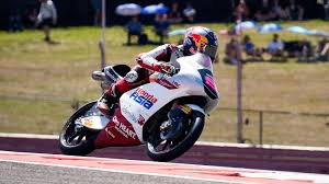 Veda Pratama celebrates on the podium at the Grand Prix of Brazil