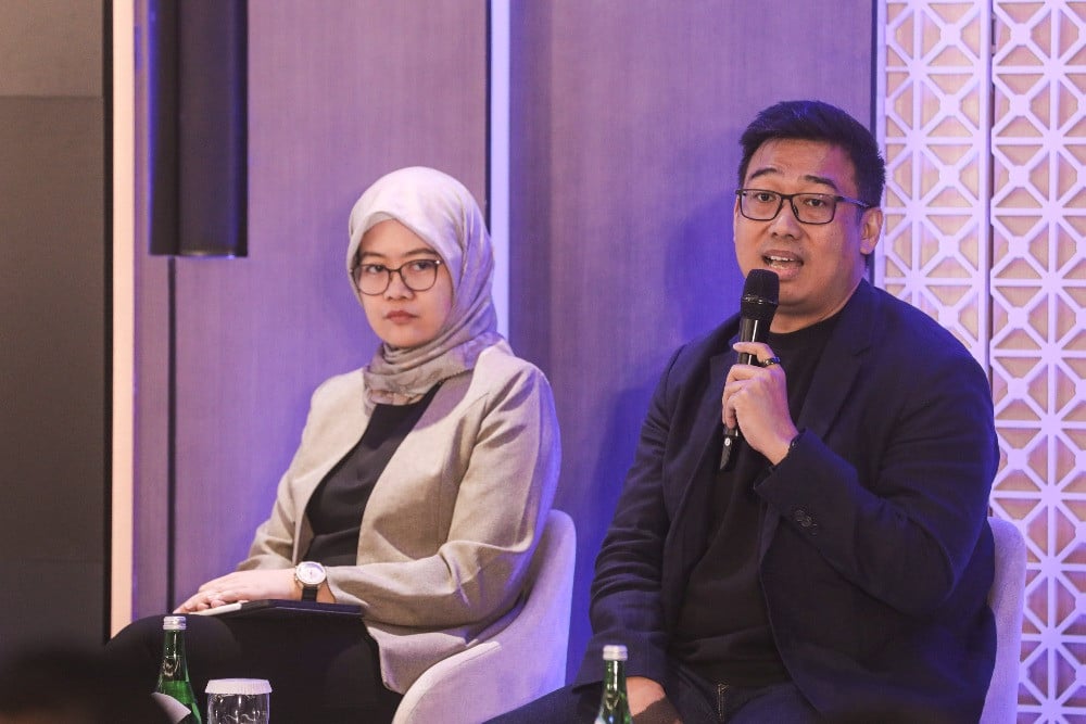 Investing Partner GDP Venture Antonny Liem (kanan) dan EVP Divisi Engineering, Riset dan Teknologi Informasi PT Hutama Karya (Persero) Amy Rachmadhani Widyastuti mengikuti Innovation Session pada acara Indonesia Ethical AI Summit di Jakarta, Rabu (17/6/2026)/JIBI/Bisnis/Arief Hermawan P