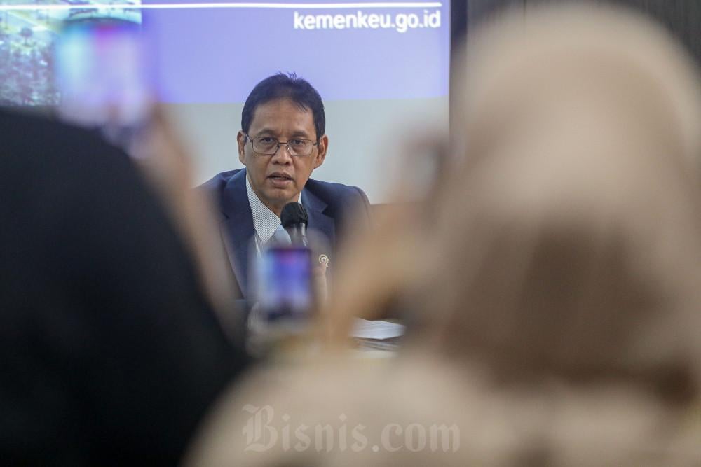 Menteri Keuangan Purbaya Yudhi Sadewa menjawab pertanyaan wartawan saat media briefing di Jakarta, Jumat (26/6/2026). / Bisnis-Eusebio Chrysnamurti