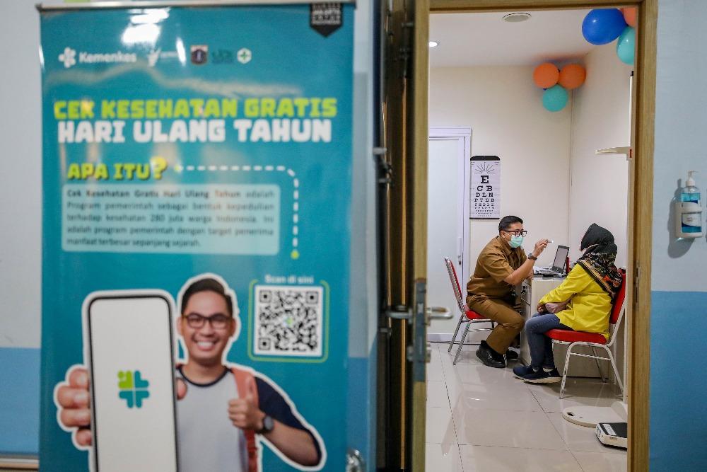 Ilustrasi. Warga mengikuti program Cek Kesehatan Gratis di Puskesmas Tanah Abang, Jakarta, Senin (10/2/2025). JIBI/Bisnis/Eusebio Chrysnamurti