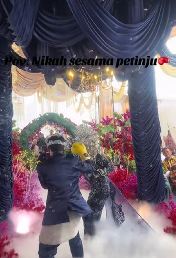 Viral aksi tinju pengantin di Jambi yang jadi sorotan ternyata konsep pernikahan impian yang sudah mereka dambakan sejak lama. Foto: Dok. Threads @rusydinasabila26.